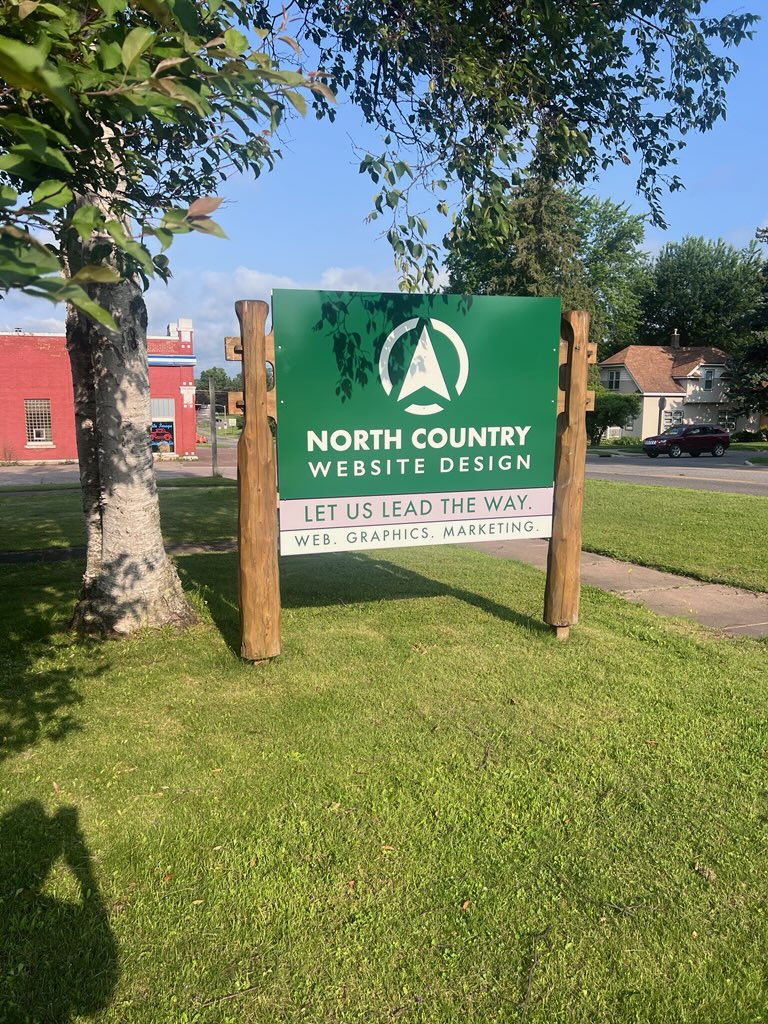 North Country Website Design Sign out front in Crystal Falls, MI